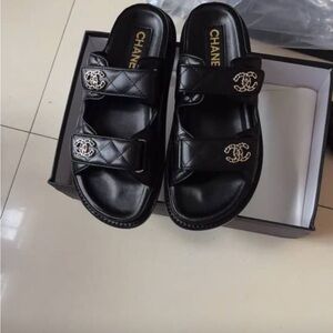 CHANEL Black Quilted Slide Sandals “Chanel”